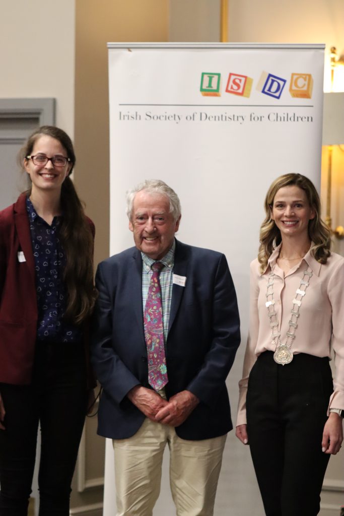 Winner of O Mullane Prize Rebecca Cortney with Prof Denis O Mullane and President of the ISDC Nicolette Ravenscroft